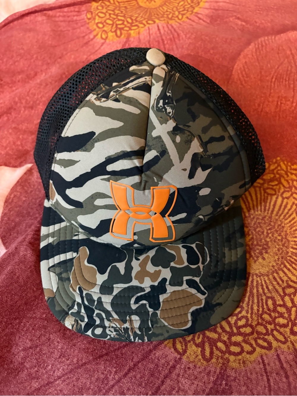 Under Armour Camo Trucker Hat with Orange Logo Accent